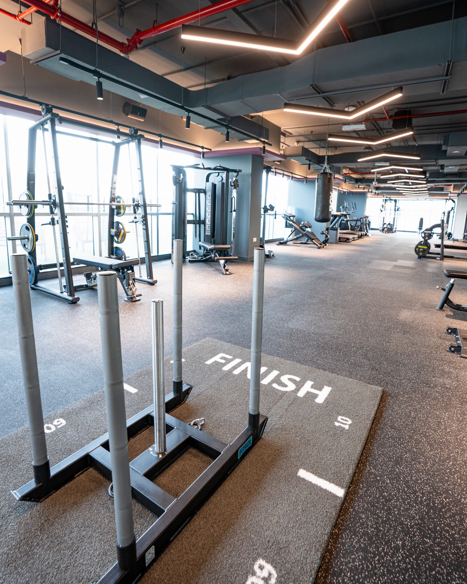 Equipt installation · high-end facility · dramatic lighting